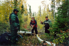Edwin Gaucher of Explorateurs-Innovateurs de Québec Inc. conducts geophysical work at the company's Oxford Lake property, with the assistance of local prospectors Harold Frieses and Brian Beardy.
