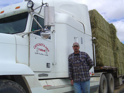 Glenn Chychota and his semi hauling hay