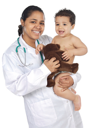 doctor holding a boy and teddy bear