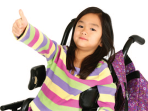 girl in a wheelchair giving a thumbs up