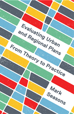 Book cover for Evaluating Urban and Regional Plans. The cover features a mosaic of rectangular blocks in red, blue, green, yellow, grey, and white arranged in a grid pattern. Several white bands containing text run diagonally across the colourful geometric design.